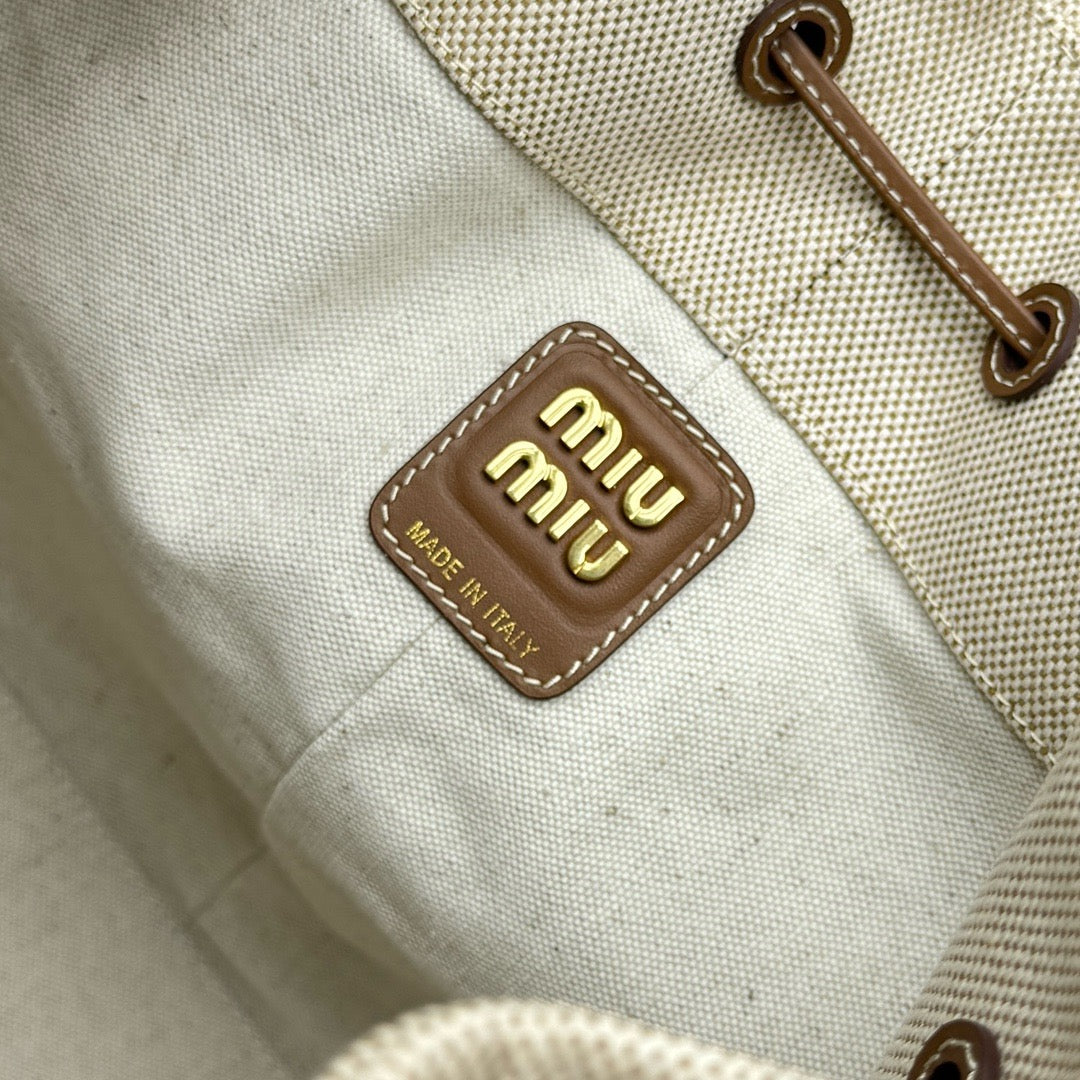 MIU MIU - logo-appliquéd canvas bucket bag