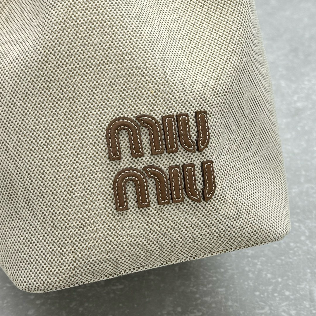 MIU MIU - logo-appliquéd canvas bucket bag