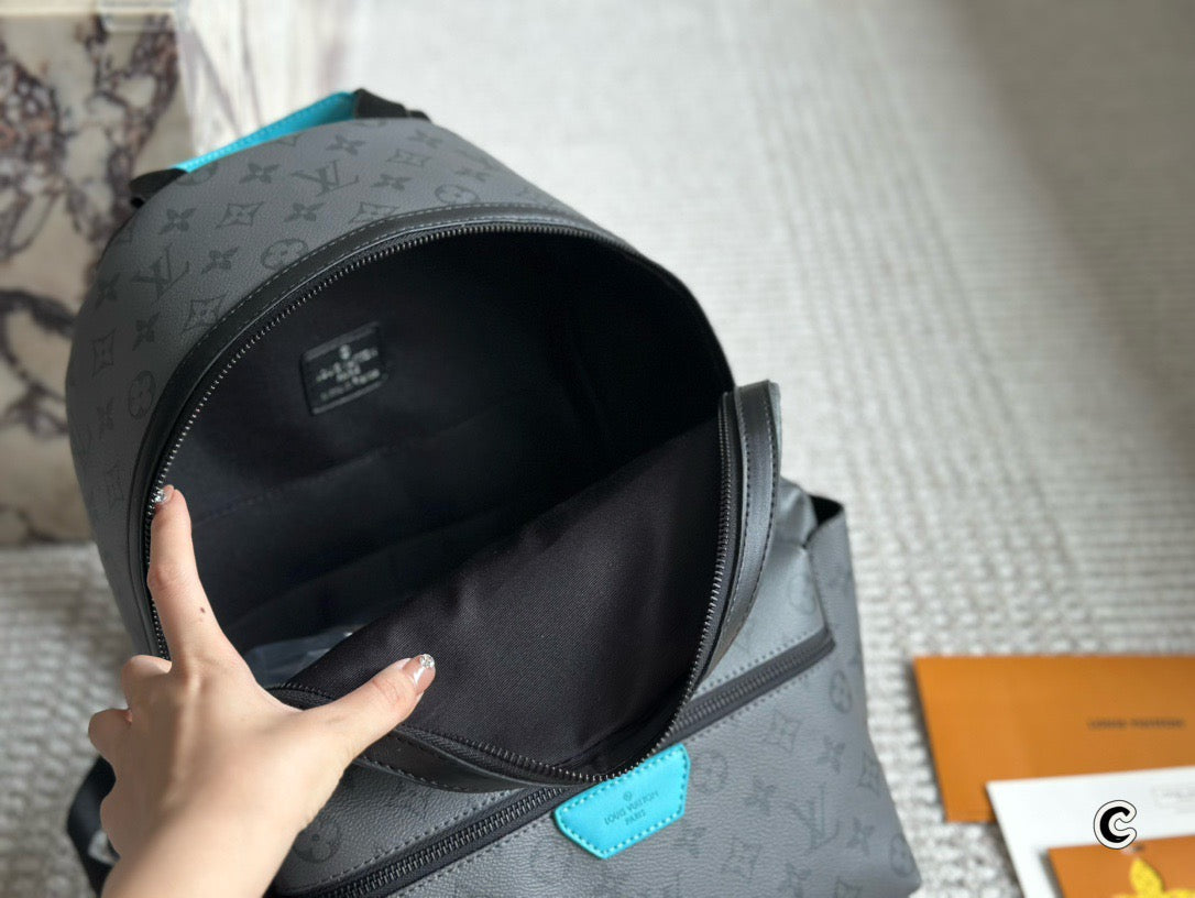 LOUIS VUITTON- Discovery Backpack PM