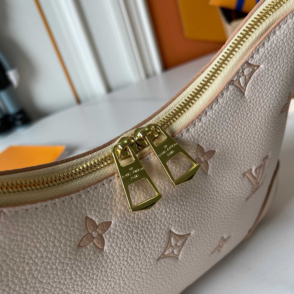 LOUIS VUITTON- Odeon
