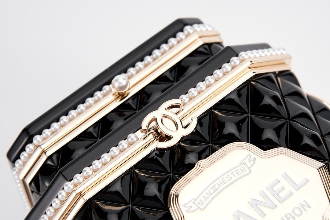 CHANEL - Limited Edition Black Quilted Resin Tea Box Minaudiere Imitation Pearl and Gold Hardware, 2024