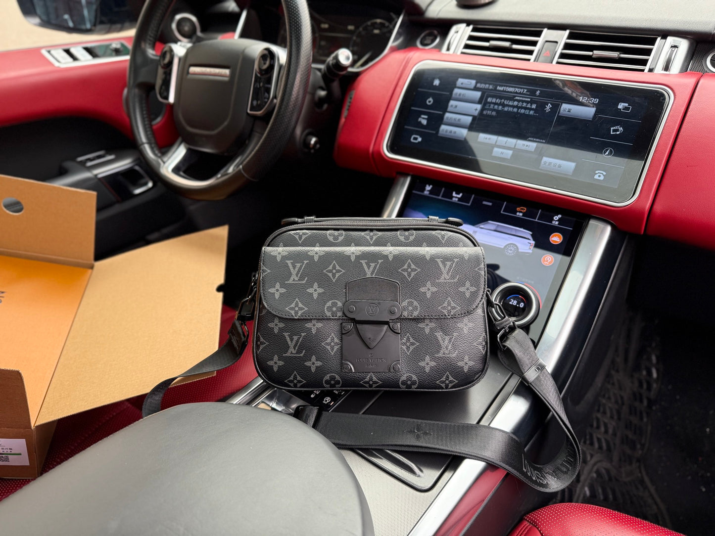 LOUIS VUITTON- Men’s S Lock Messenger bag