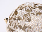 CHANEL - Gold Metal Strass Crystal Sphere Minaudiere Clutch Gold Hardware, 2025