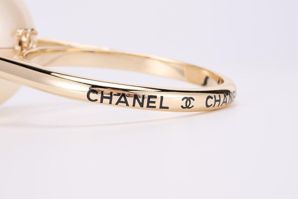 CHANEL - Cruise Pearled Cylinder Minaudière with Gold Handle
