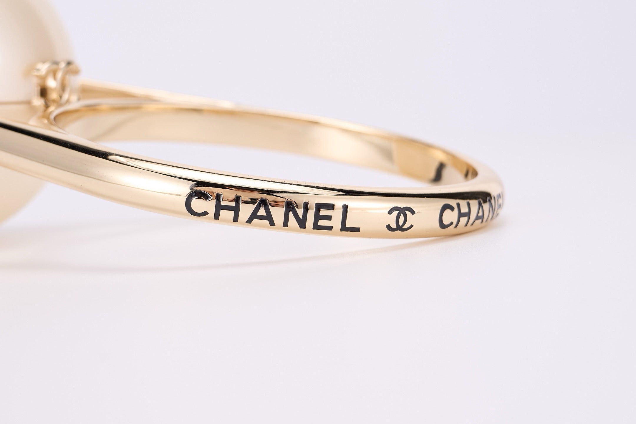 CHANEL - Cruise Pearled Cylinder Minaudière with Gold Handle