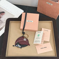 MIU MIU - leather key ring trick