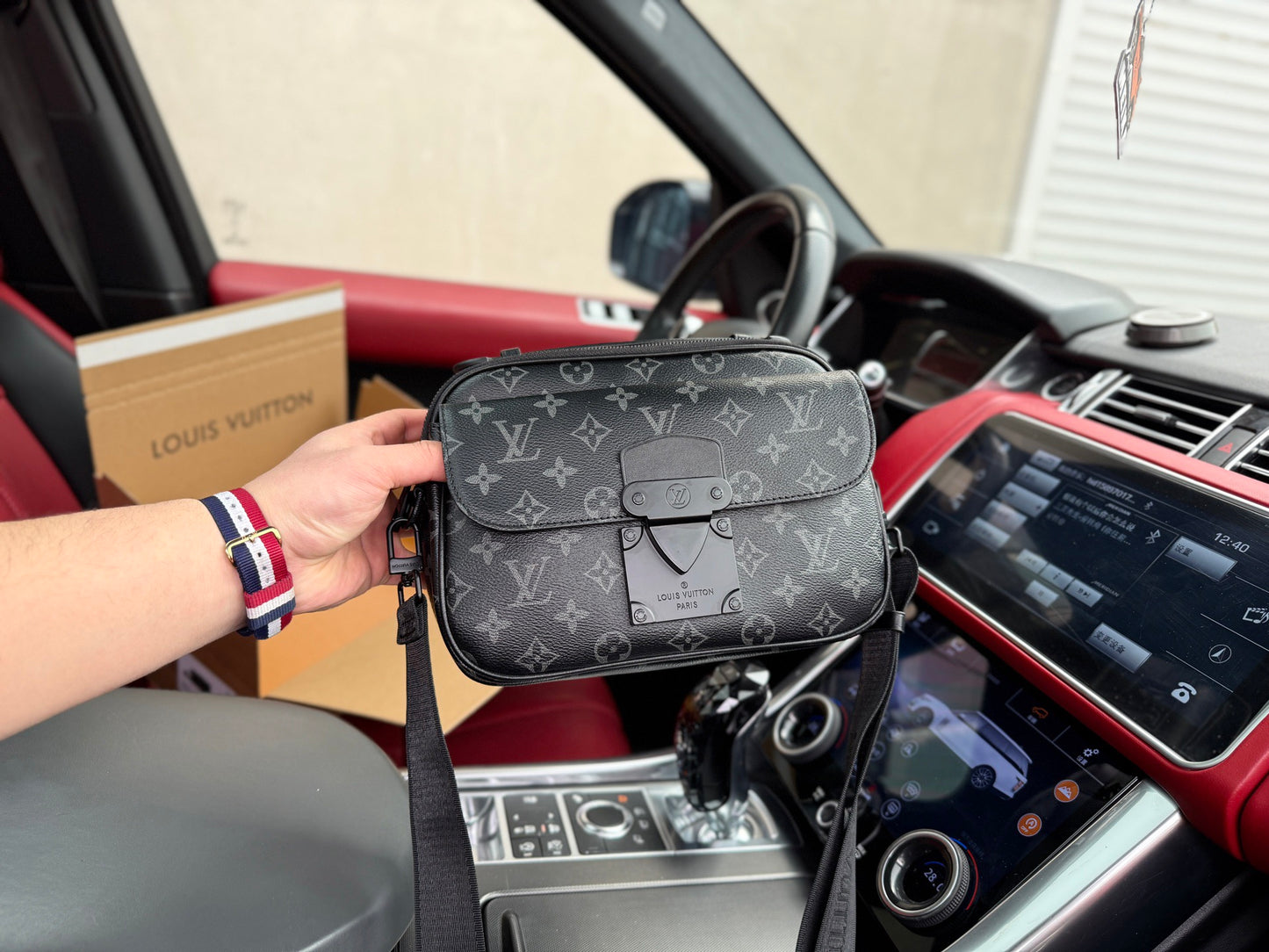 LOUIS VUITTON- Men’s S Lock Messenger bag