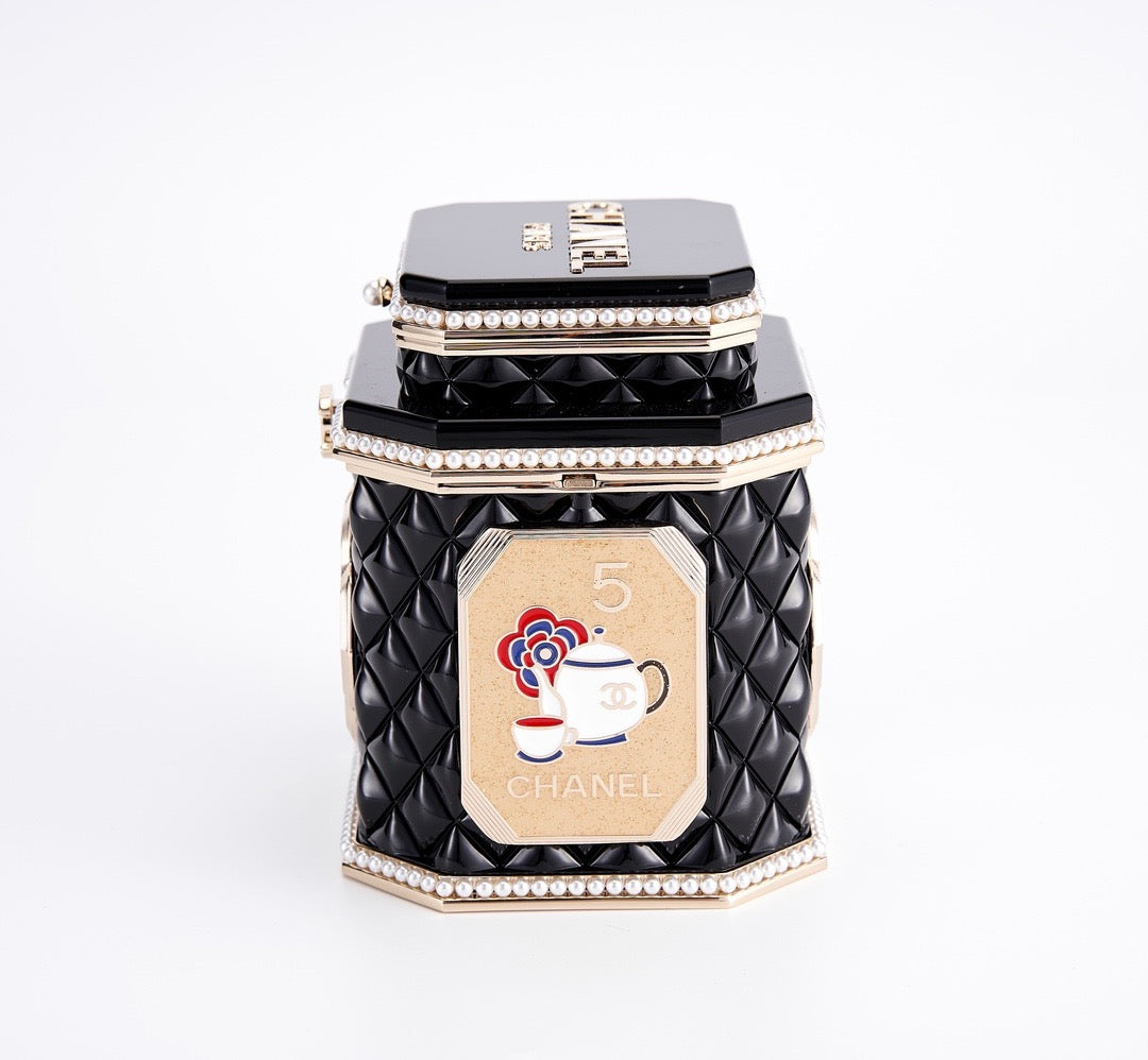 CHANEL - Limited Edition Black Quilted Resin Tea Box Minaudiere Imitation Pearl and Gold Hardware, 2024