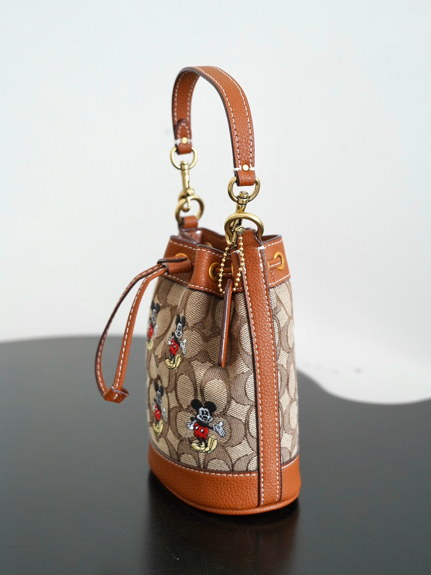 COACH - Disney Mini Dempsey Bucket Bag In Signature Jacquard Mickey Mouse
