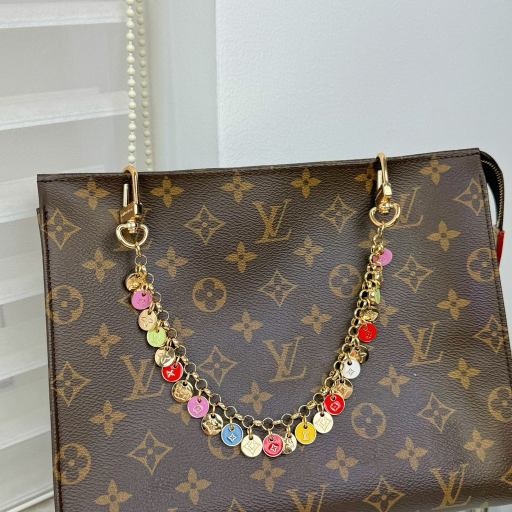 LOUIS VUITTON- bag charm