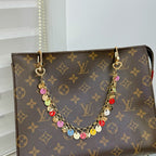 LOUIS VUITTON- bag charm