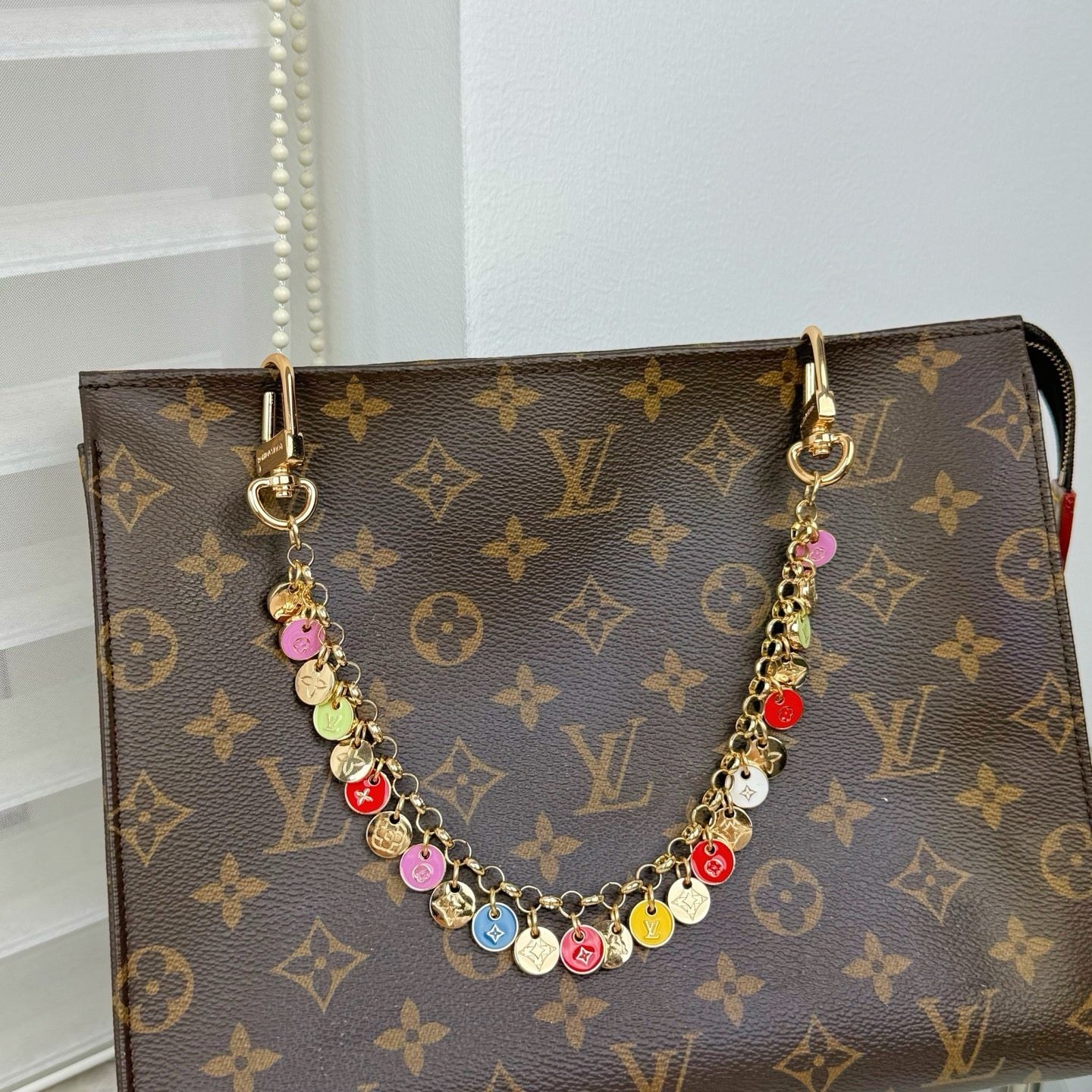 LOUIS VUITTON- bag charm