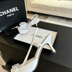 CHANEL - Vintage Iconic "CC" White & Black Toe Cap Slingback Heels