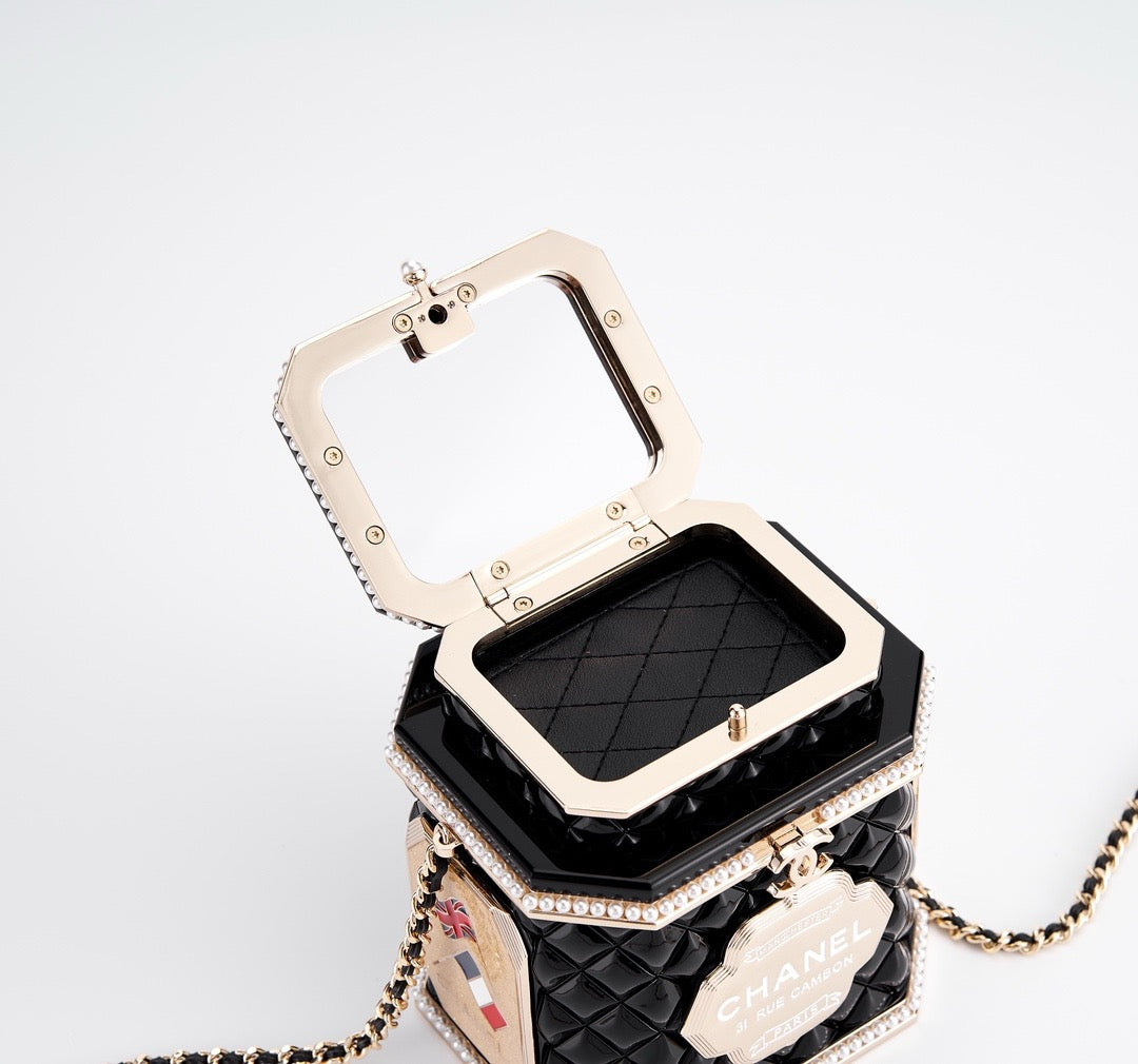 CHANEL - Limited Edition Black Quilted Resin Tea Box Minaudiere Imitation Pearl and Gold Hardware, 2024