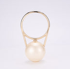 CHANEL - Cruise Pearled Cylinder Minaudière with Gold Handle
