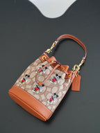 COACH - Disney Mini Dempsey Bucket Bag In Signature Jacquard Mickey Mouse