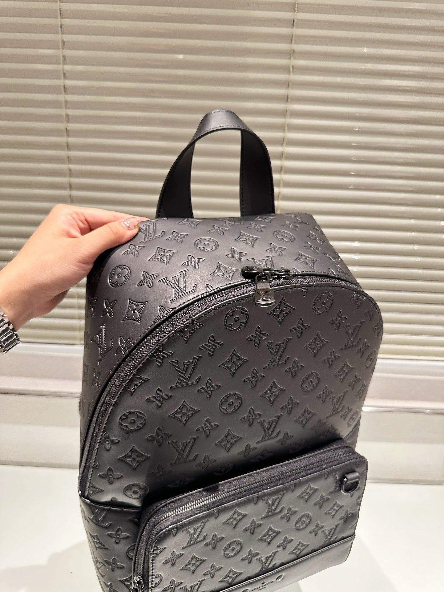 LOUIS VUITTON- Leather Backpack