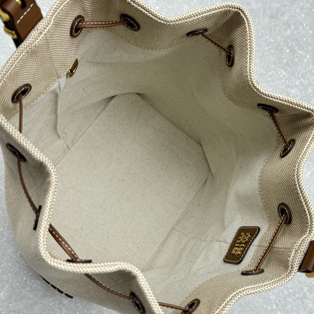 MIU MIU - logo-appliquéd canvas bucket bag