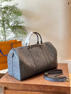LOUIS VUITTON- Keepall Bandouliere 50