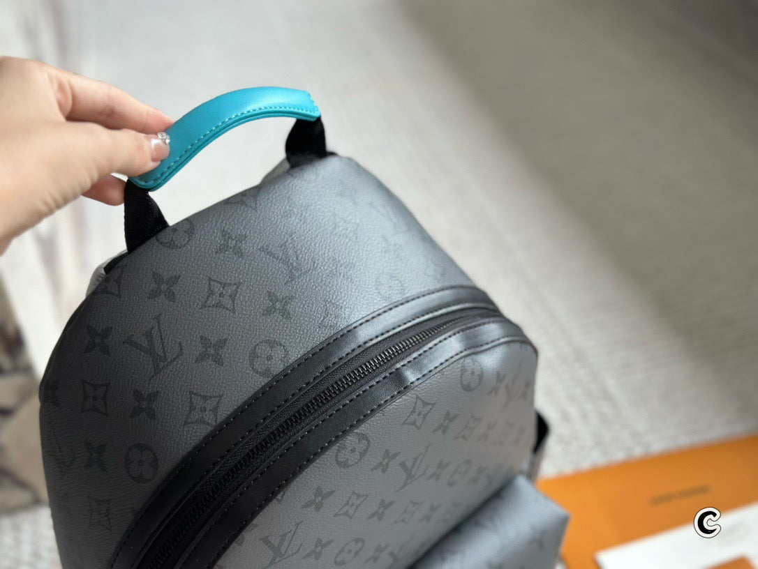 LOUIS VUITTON- Discovery Backpack PM