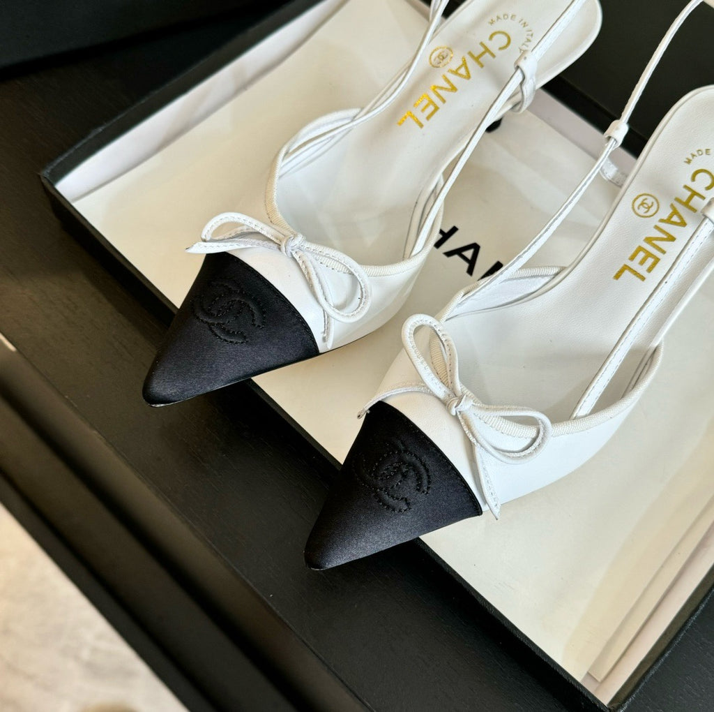 CHANEL - Vintage Iconic "CC" White & Black Toe Cap Slingback Heels