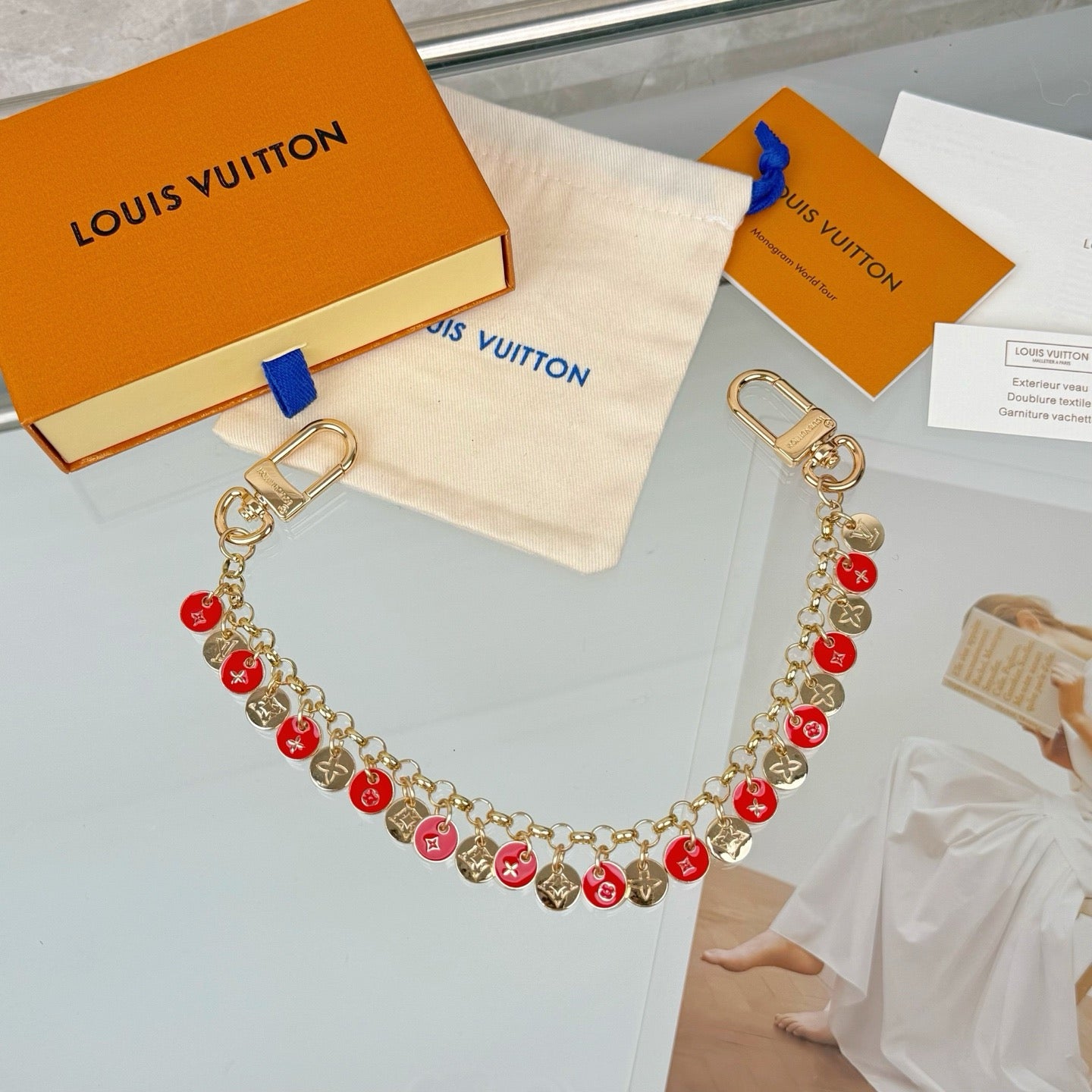 LOUIS VUITTON- bag charm