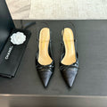 CHANEL - Vintage Iconic "CC"  Black Toe Cap Slingback Heels
