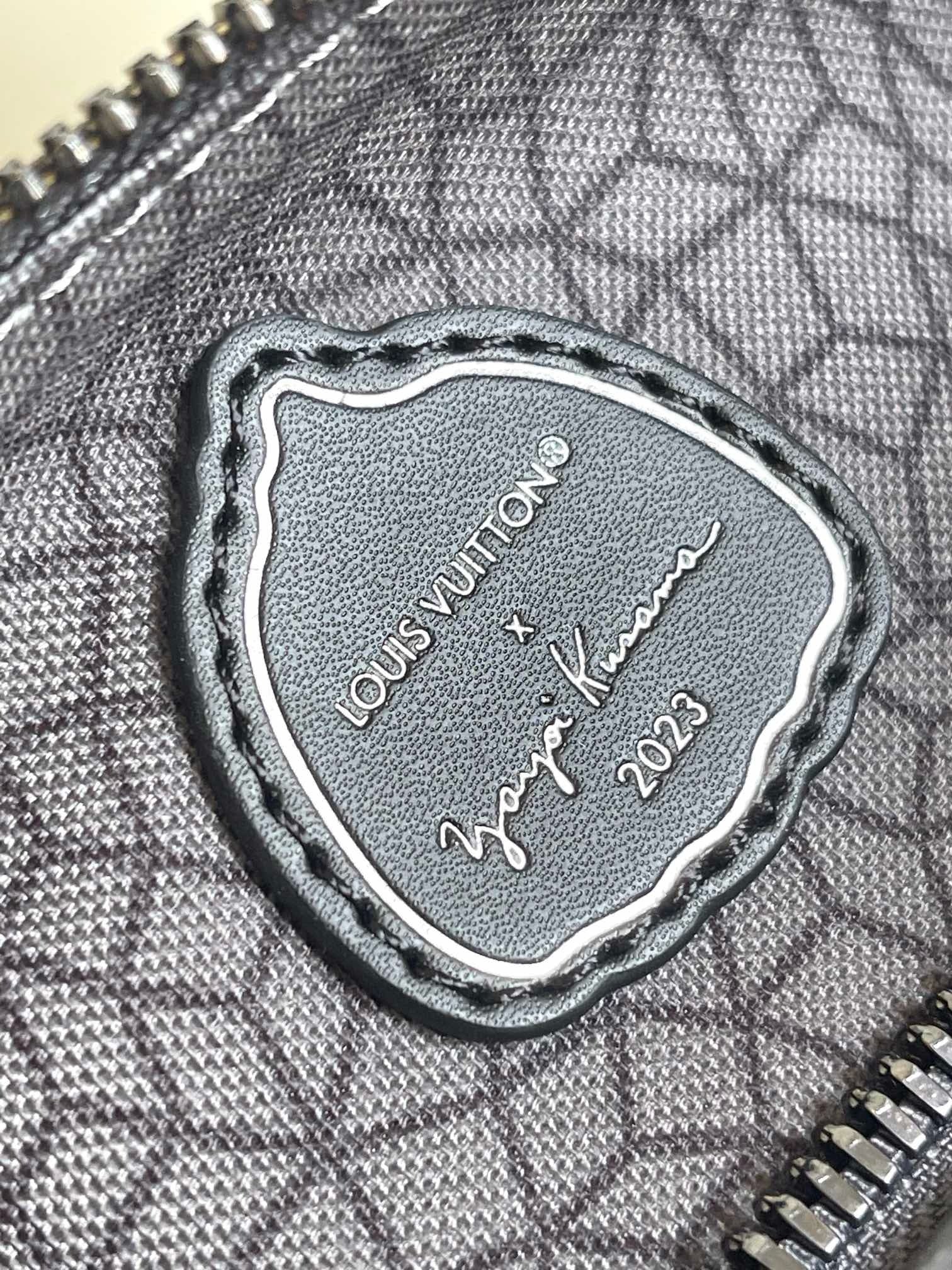 LOUIS VUITTON - LV X YK Monogram Eclipse Reverse Pumpkin Keepall Bandouliere 25