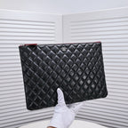 CHANEL - Lambskin O Case clutch bag