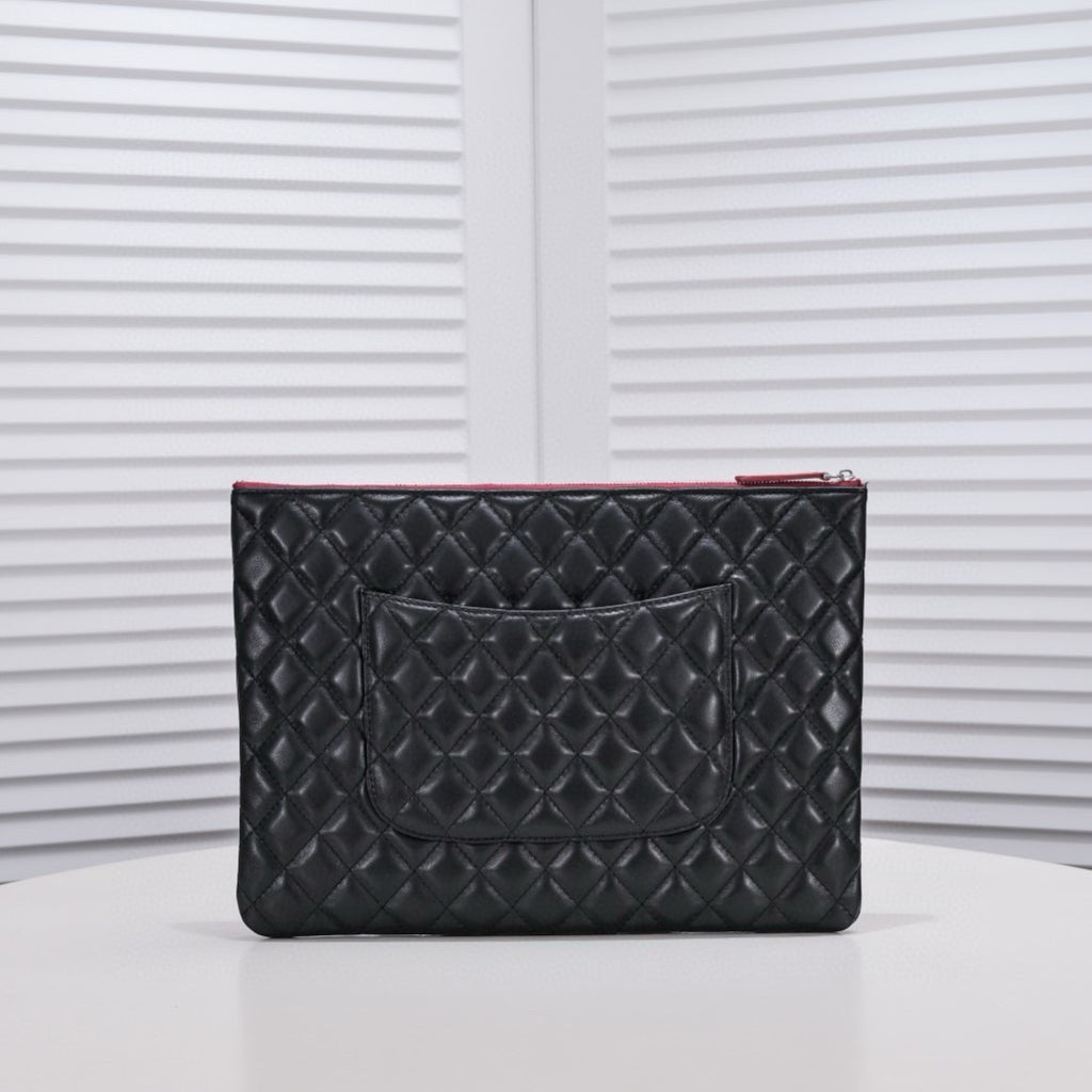 CHANEL - Lambskin O Case clutch bag