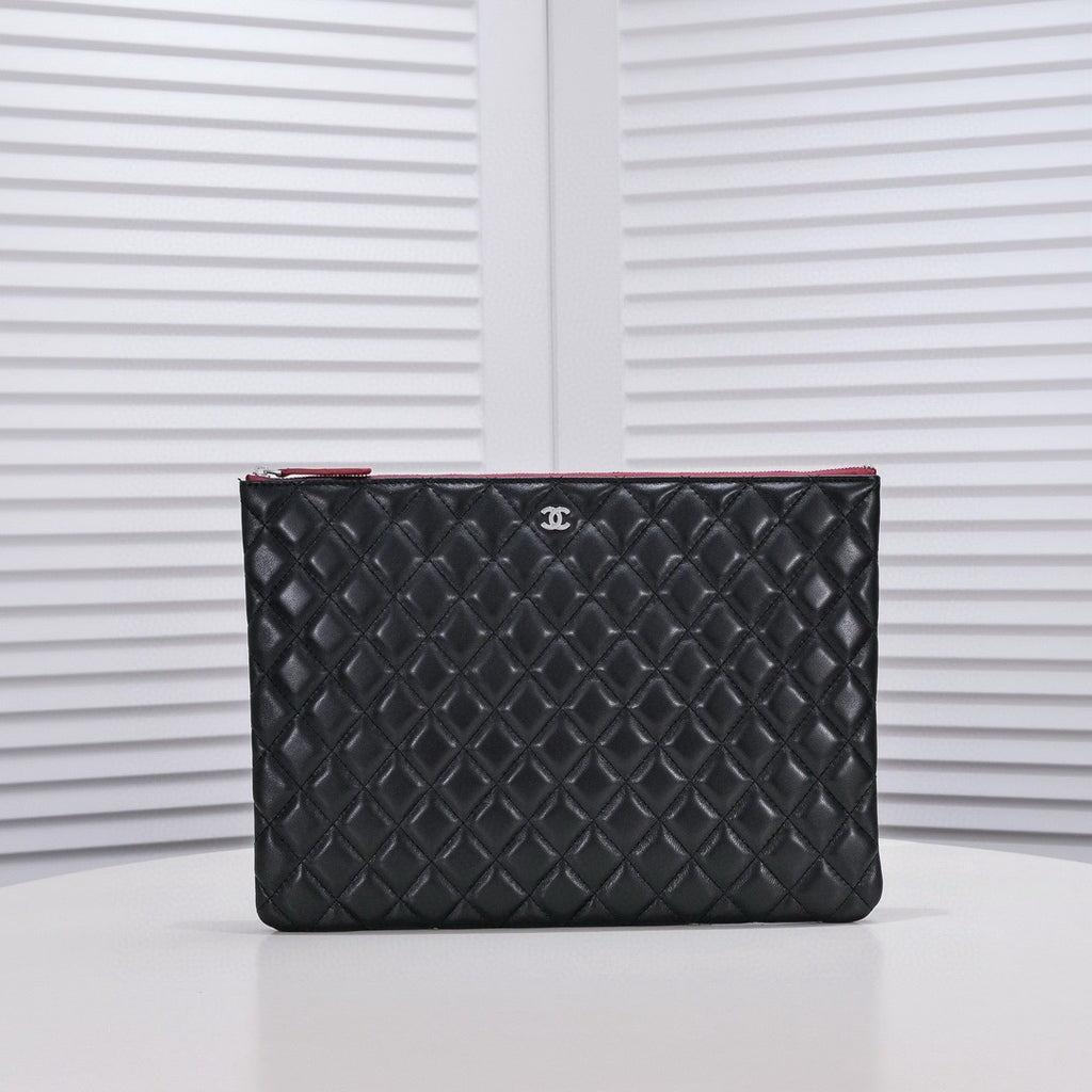 CHANEL - Lambskin O Case clutch bag