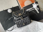 CHANEL - QUILTED CALFSKIN LARGE DUMA BACKPACK