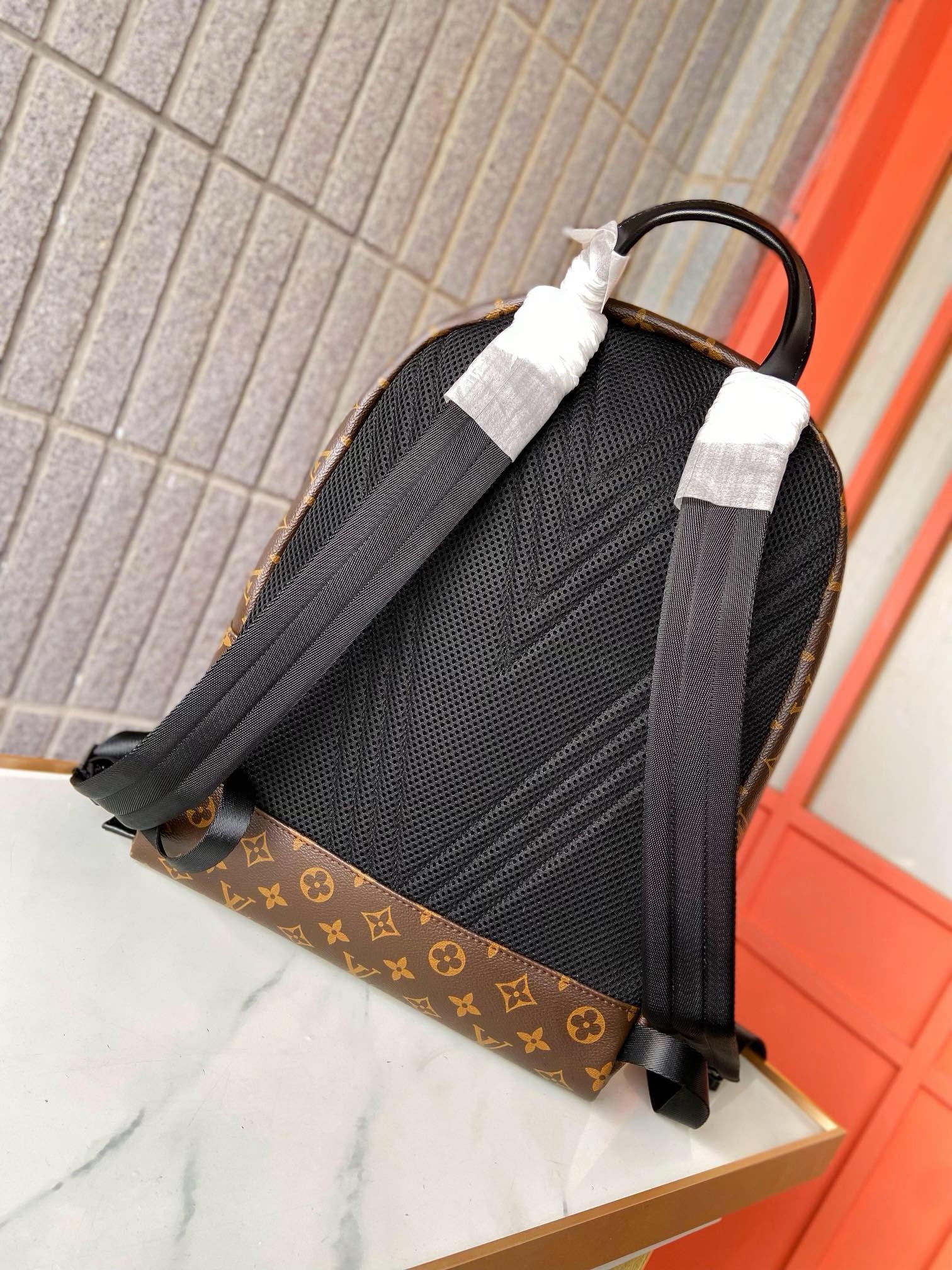 LOUIS VUITTON - Discovery Backpack PM