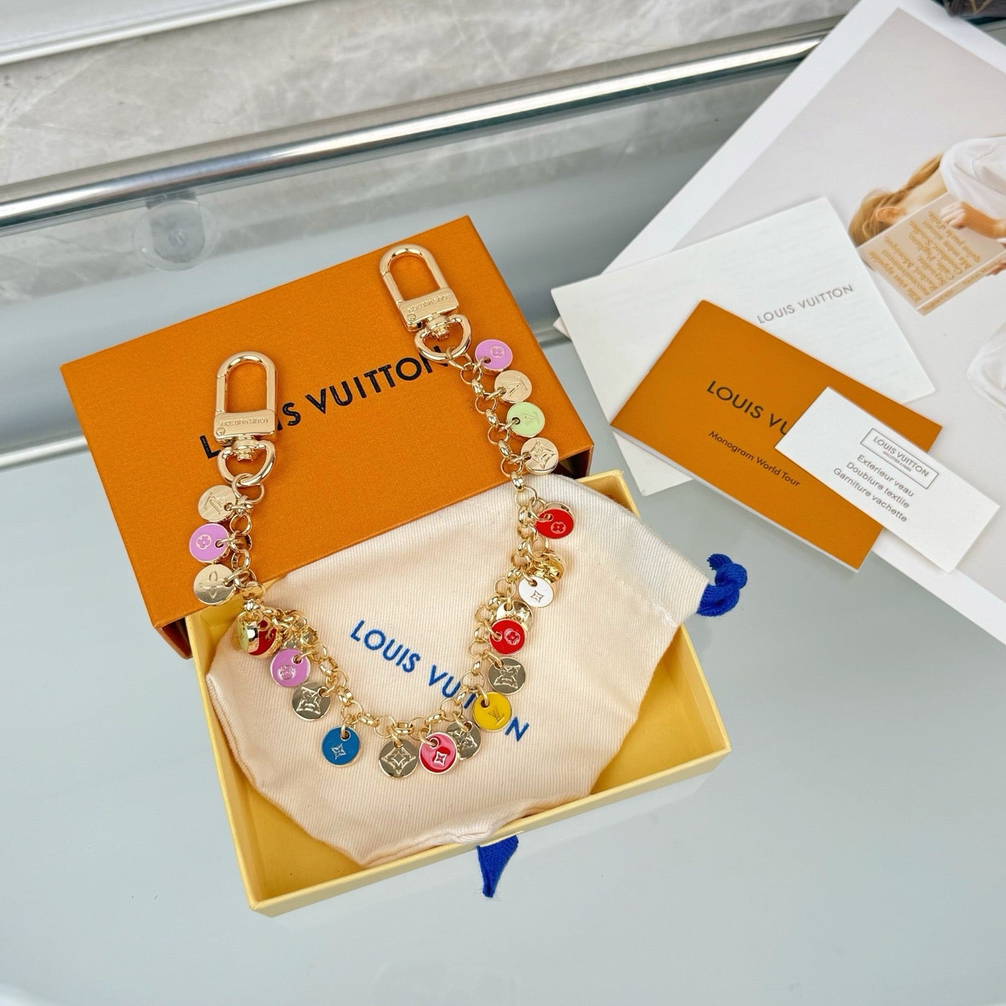 LOUIS VUITTON- bag charm