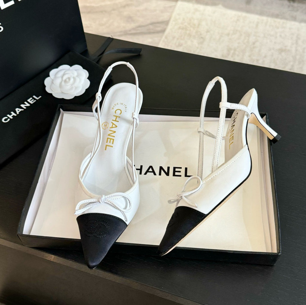 CHANEL - Vintage Iconic "CC" White & Black Toe Cap Slingback Heels