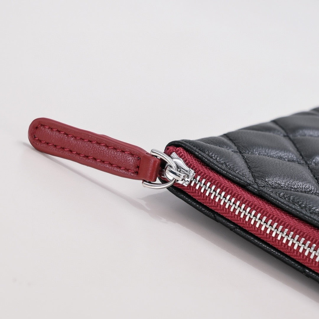 CHANEL - Lambskin O Case clutch bag