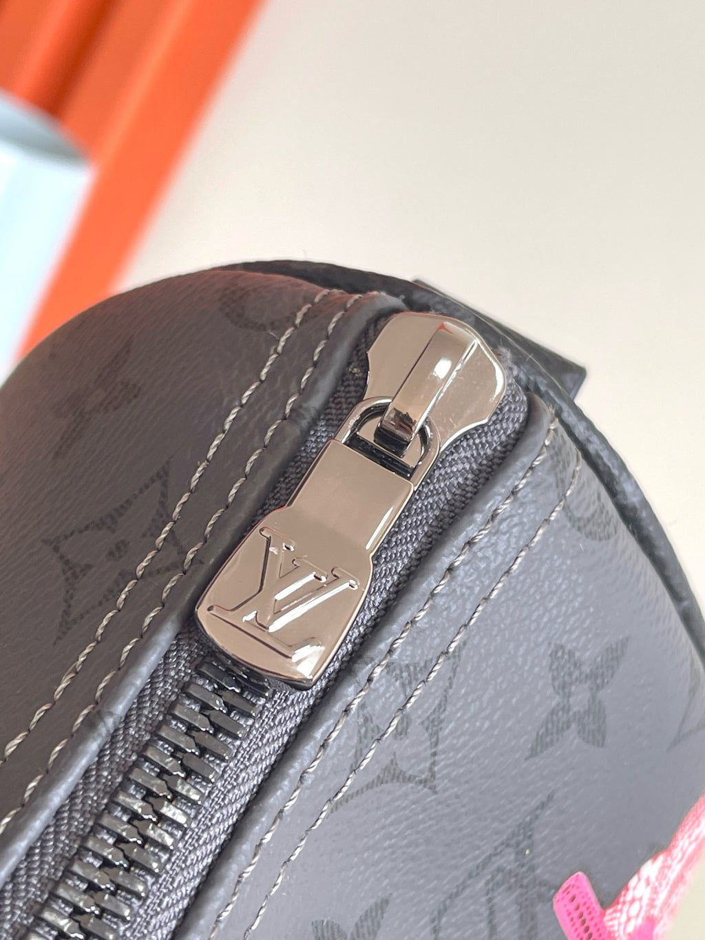 LOUIS VUITTON - LV X YK Monogram Eclipse Reverse Pumpkin Keepall Bandouliere 25