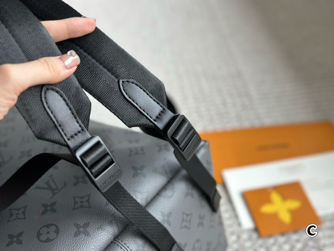 LOUIS VUITTON- Discovery Backpack PM