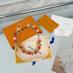 LOUIS VUITTON- bag charm
