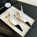CHANEL - Vintage Iconic "CC" White & Black Toe Cap Slingback Heels