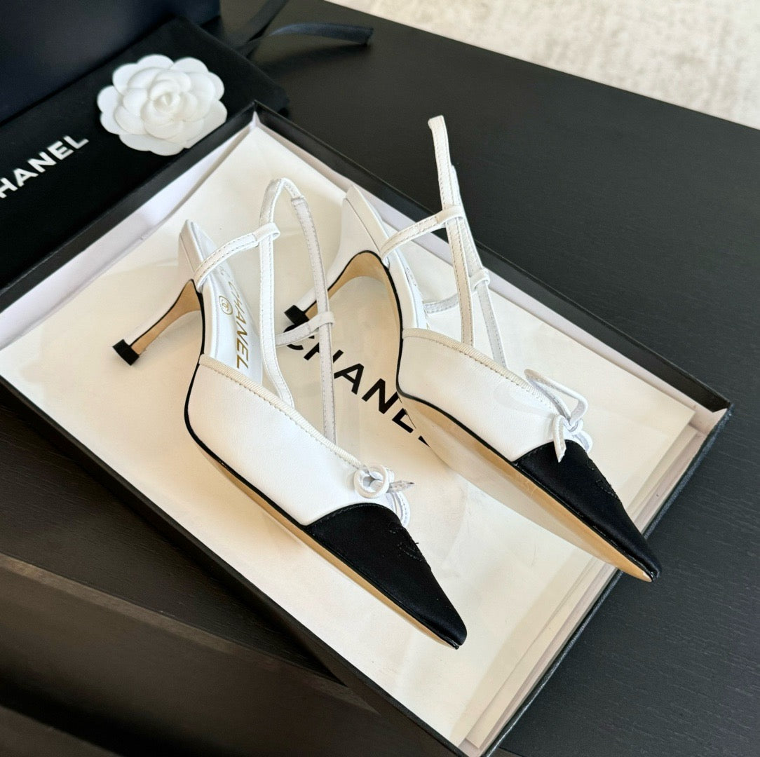 CHANEL - Vintage Iconic "CC" White & Black Toe Cap Slingback Heels
