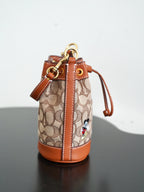 COACH - Disney Mini Dempsey Bucket Bag In Signature Jacquard Mickey Mouse