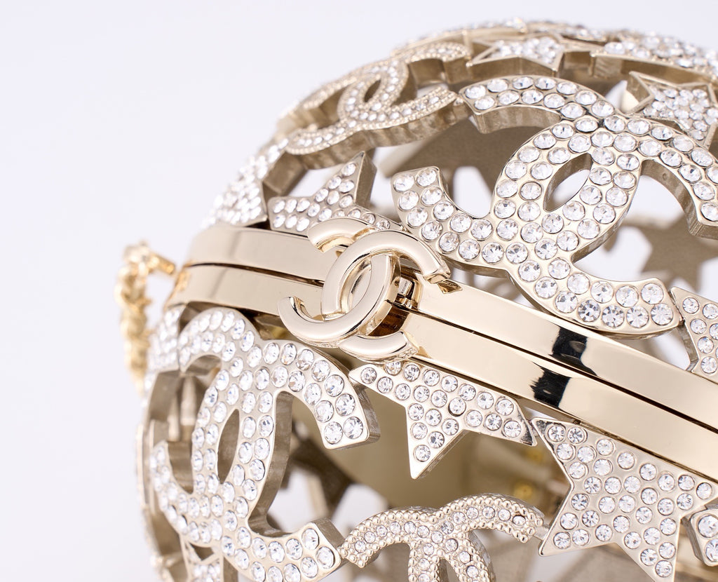 CHANEL - Gold Metal Strass Crystal Sphere Minaudiere Clutch Gold Hardware, 2025