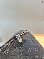 LOUIS VUITTON- Keepall Bandouliere 50