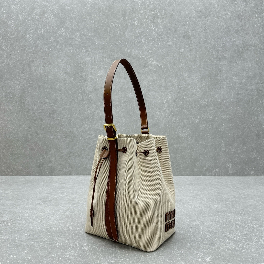 MIU MIU - logo-appliquéd canvas bucket bag