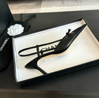 CHANEL - Vintage Iconic "CC"  Black Toe Cap Slingback Heels