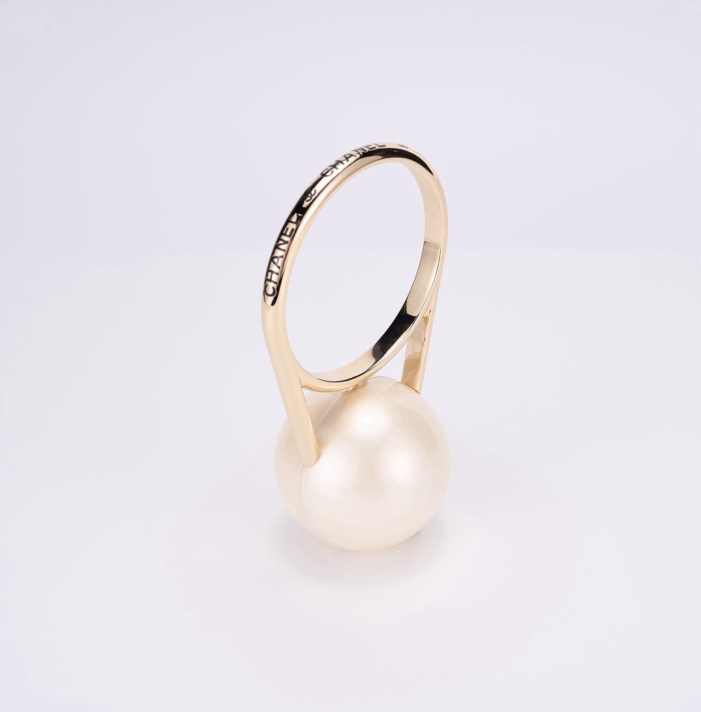 CHANEL - Cruise Pearled Cylinder Minaudière with Gold Handle
