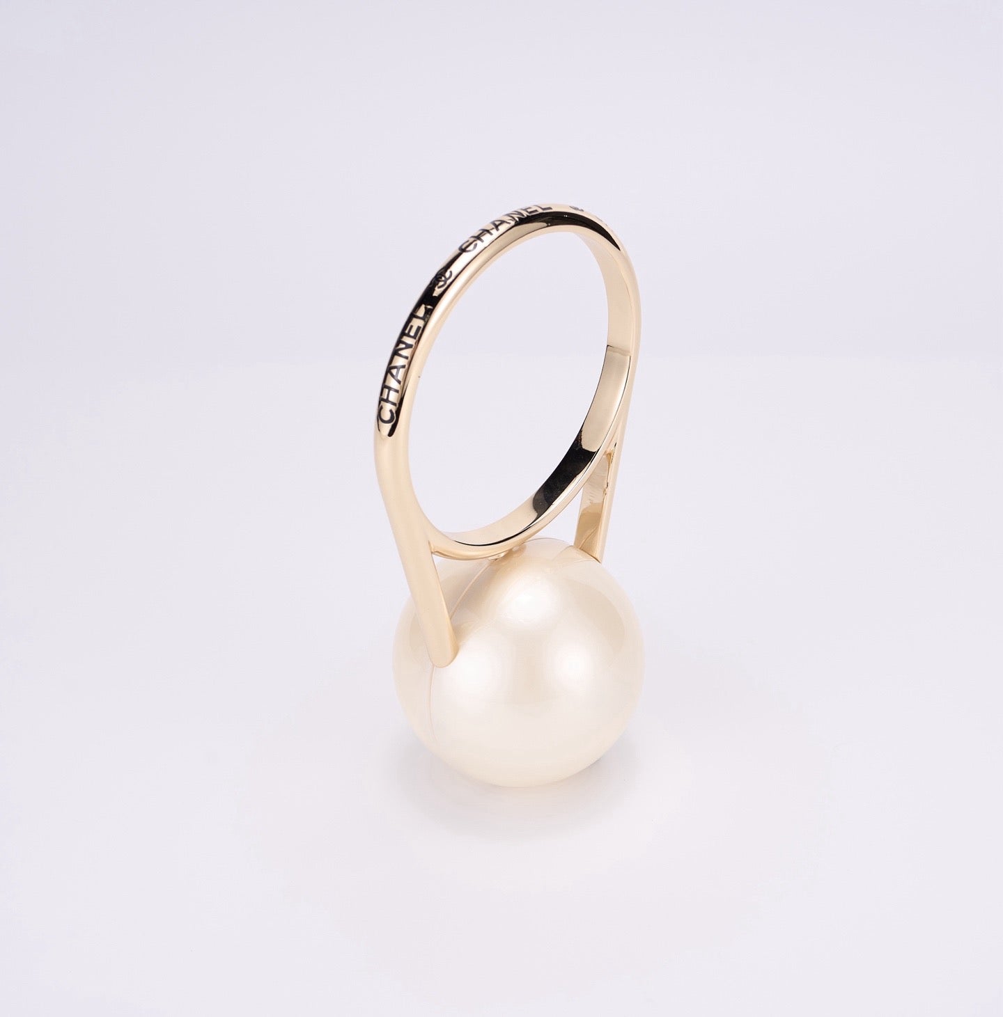 CHANEL - Cruise Pearled Cylinder Minaudière with Gold Handle