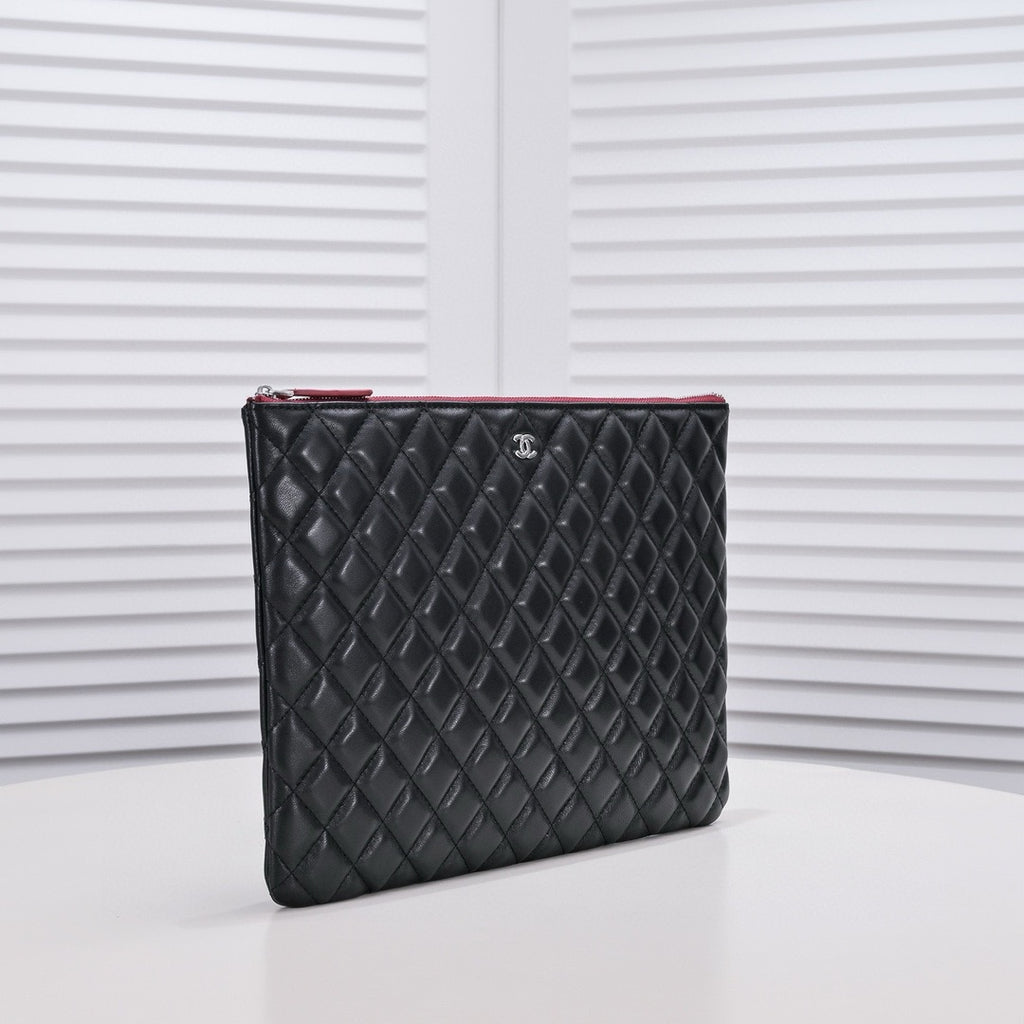 CHANEL - Lambskin O Case clutch bag