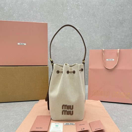 MIU MIU - logo-appliquéd canvas bucket bag